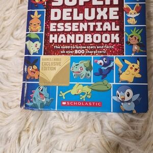 Pokemon Scholastic Super Deluxe Handbook with Red and Blue Cover